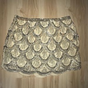 Small English rose gold sequined skirt
